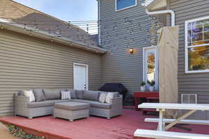 Deck with an outdoor hangout area