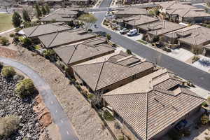 Aerial view of home showing location and proximity to trail