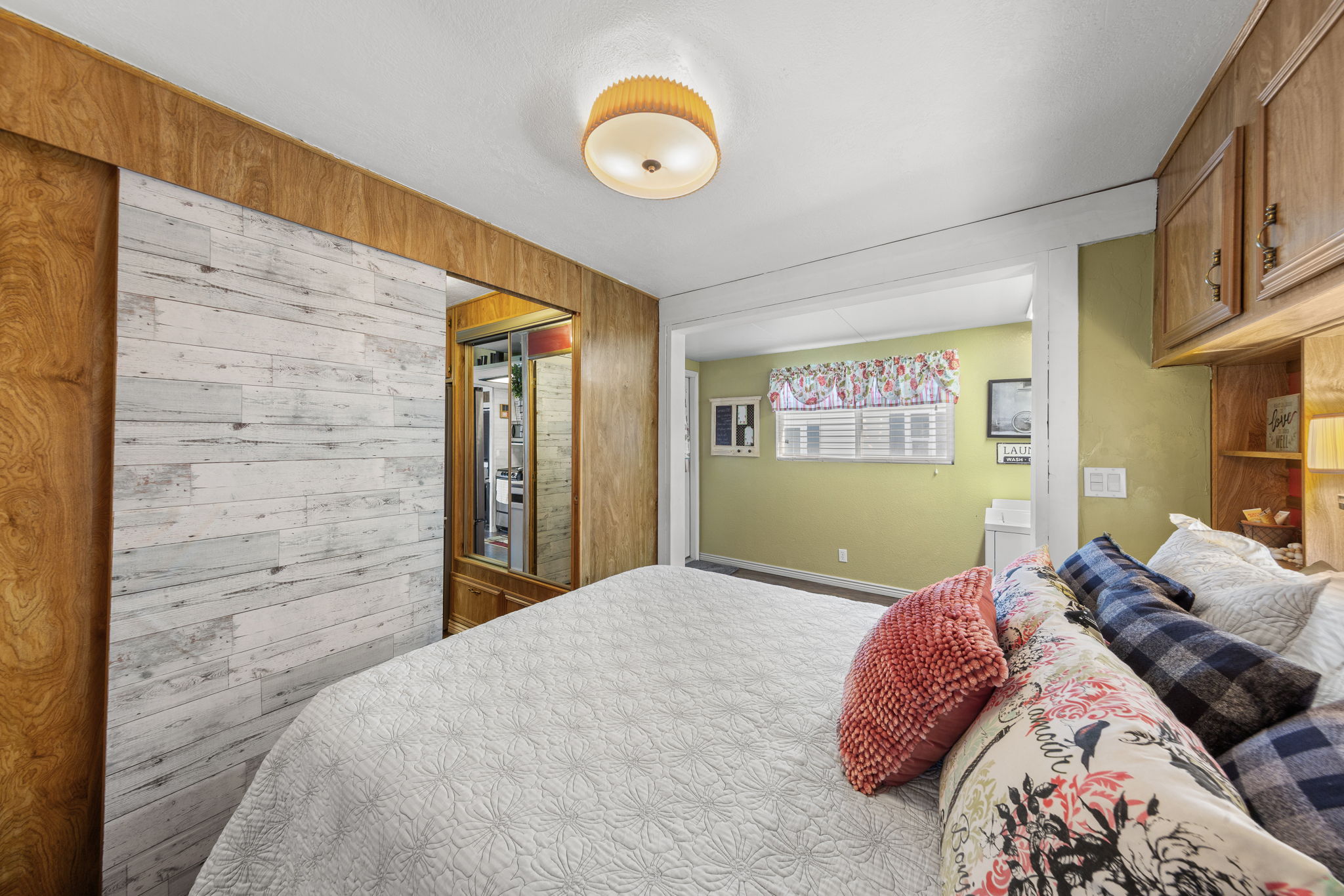 Bedroom with wooden walls