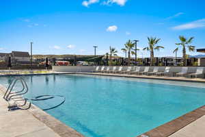 Community pool with a patio area