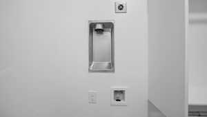 Laundry area with hookup for a washing machine and electric dryer hookup