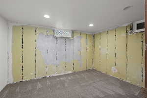 Spare room featuring carpet floors and recessed lighting