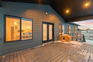 View covered Trex deck with recessed lighting