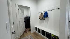 Mudroom featuring light wood-type flooring