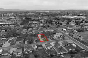 Aerial overview of property's location featuring property parcel outlined