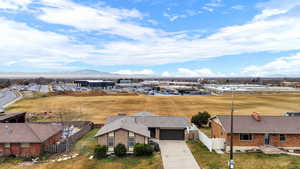View from above of property with a mountainous background