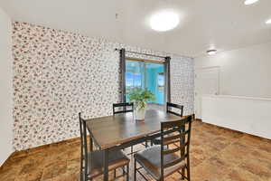 Dining area with stone finish flooring
