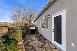 View of patio featuring area for grilling