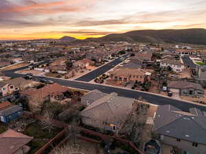 Aerial view at dusk of a residential view and a mountain view