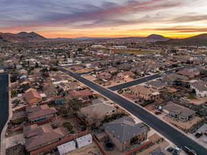 Aerial view at dusk of a mountain view and a residential view