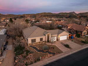 Aerial view of residential area featuring mountains