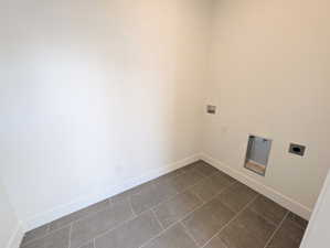 Laundry area featuring washer hookup and electric dryer hookup