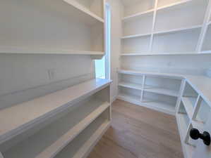 View of pantry with quartz countertop