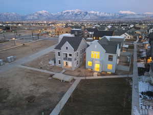 Aerial view of residential area featuring mountains