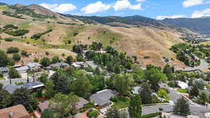 Aerial view of residential area with mountains