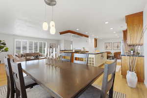 Dining area featuring light wood-style flooring and recessed lighting