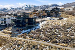 View of mountain backdrop with nearby suburban area