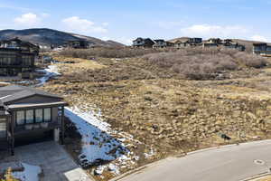 View of mountain backdrop with nearby suburban area