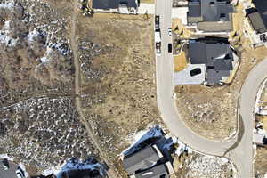 View of property location with nearby suburban area