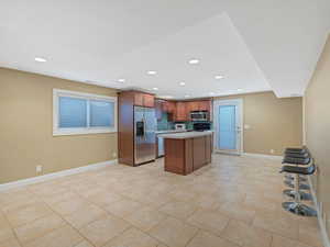 SECOND BASEMENT KITCHEN WITH SEPARATE WALK-OUT