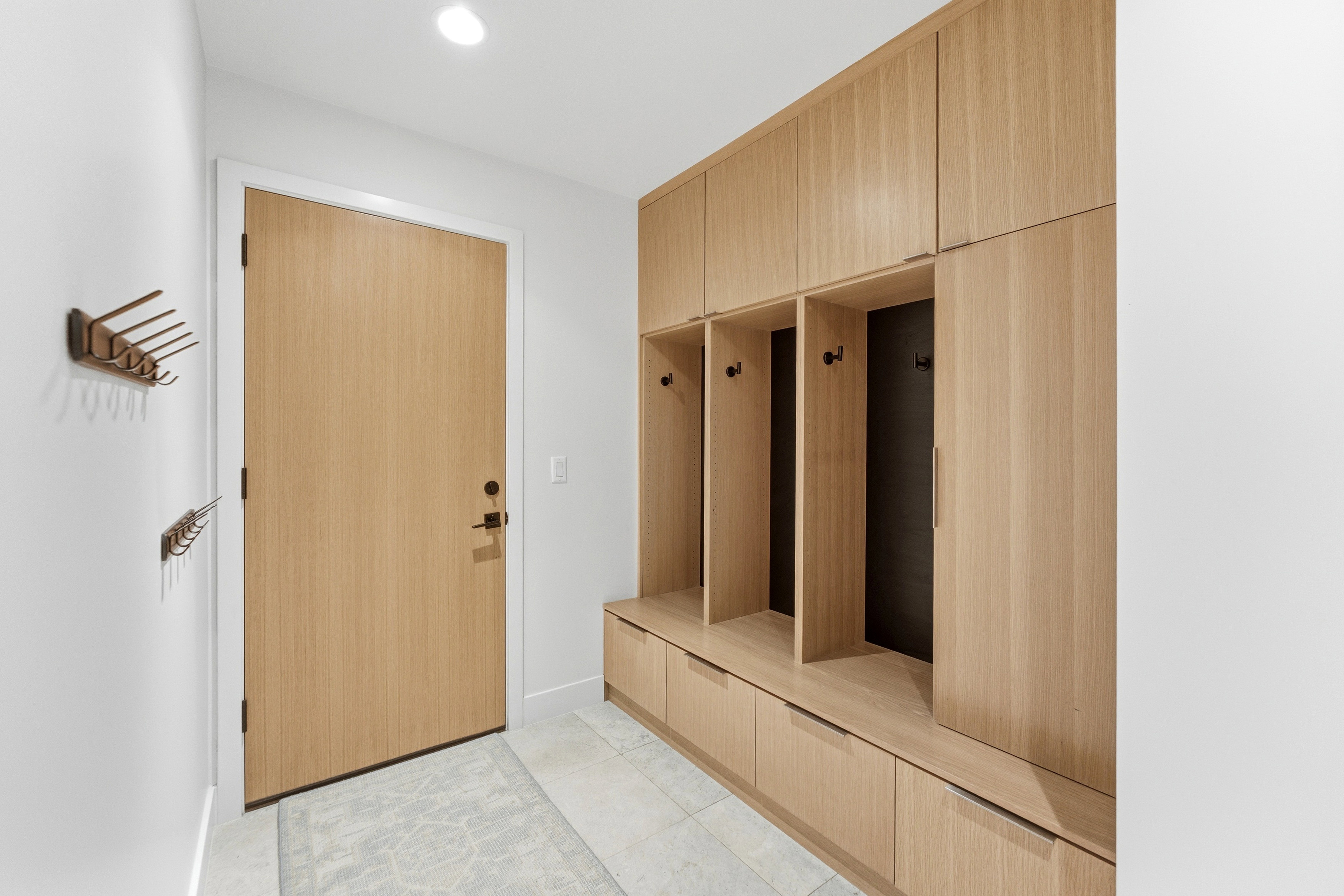 Mudroom featuring recessed lighting