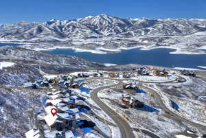 Snowy aerial view with a mountain view