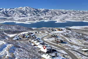 Snowy aerial view with a mountain view