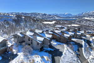 Snowy aerial view with a mountain view