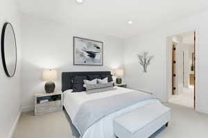 Bedroom featuring light colored carpet and recessed lighting