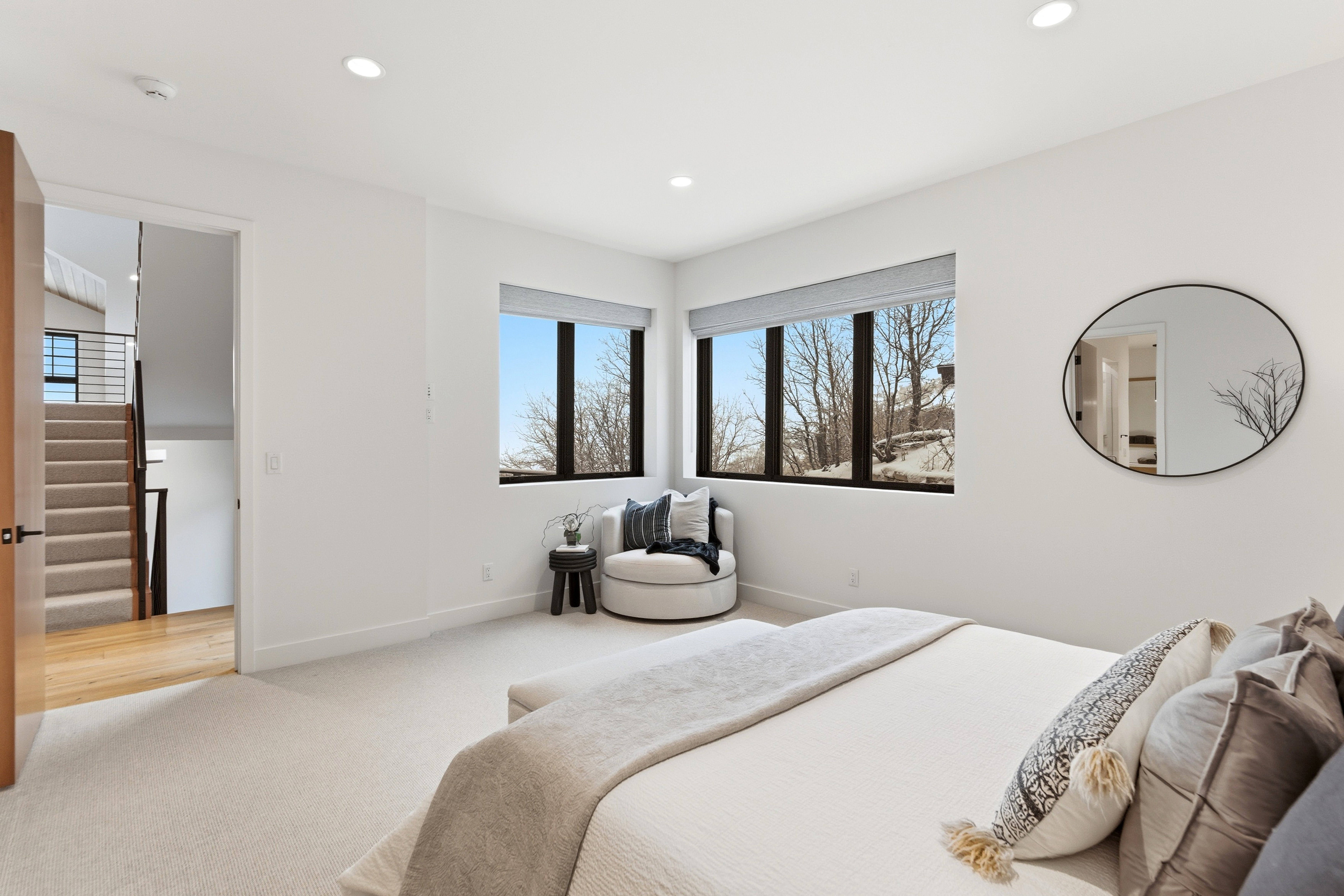 Bedroom featuring light colored carpet and recessed lighting
