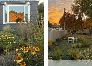 Yard at dusk with a fenced backyard and outdoor dining area