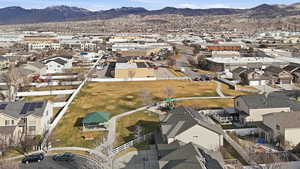 Aerial view of residential area with a mountain backdrop