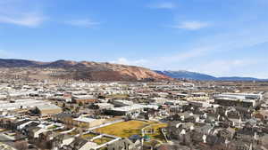 View of mountain background featuring nearby suburban area