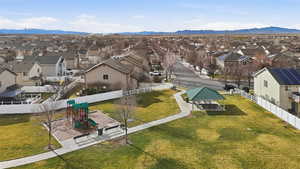 Aerial perspective of suburban area with a mountain backdrop