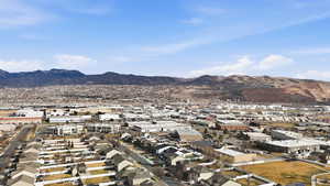 Mountain view featuring nearby suburban area