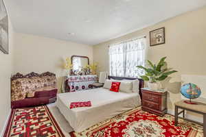 Bedroom with baseboards