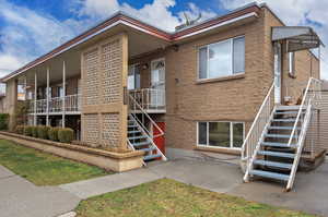 View of property with stairway