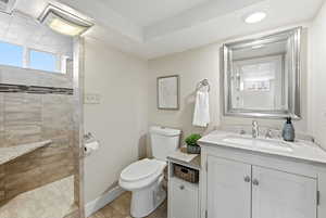 Bathroom with vanity and walk in shower