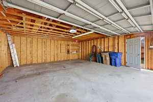 Garage featuring a garage door opener