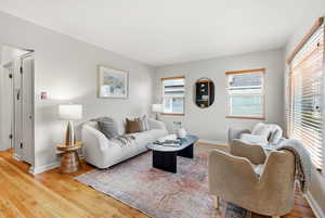 Living area with light wood-type flooring