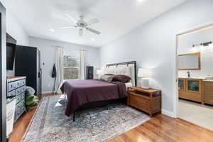 Bedroom featuring light wood-style floors and a ceiling fan