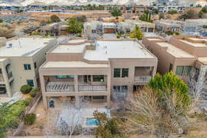 Aerial view of residential area featuring a mountainous background
