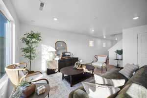 Living room featuring wood finished floors and baseboards