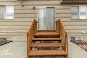 South side exterior door to steps leading to backyard.
