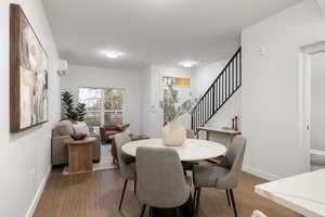 Dining area featuring wood finished floors