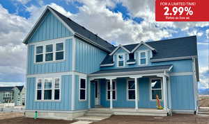 View of front of home with a shingled roof, a porch, and board and batten siding