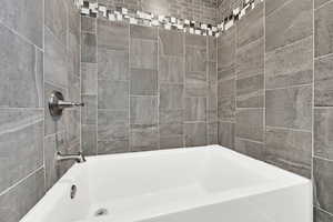 Bathroom featuring shower / bathtub combination