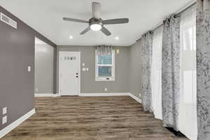 Foyer featuring ceiling fan, dark wood finished floors, and recessed lighting