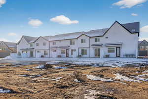 Modern inspired farmhouse with a residential view