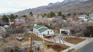 View of mountain backdrop with nearby suburban area